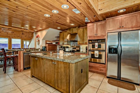 Furnished Gourmet Kitchen to accommodate your dining needs.