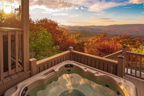 Back deck hot tub with stunning valley and mountain views!.