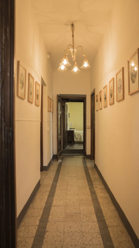 First floor. Corridor leading to bedrooms and blue bathroom.