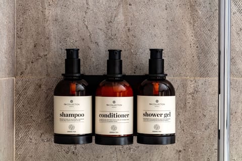 Eco-friendly toiletries, hair dryer, towels