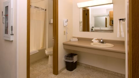 Classic Room, 2 Queen Beds (Loveseat) | Bathroom | Combined shower/tub, free toiletries, towels