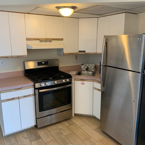 2 Bedroom Efficiency Suite (I) | Private kitchen | Full-size fridge, microwave, stovetop, coffee/tea maker