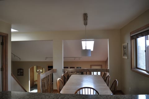 South exposure; sunny, bright and cheerful. Table seats 8 with 4 at the bar.