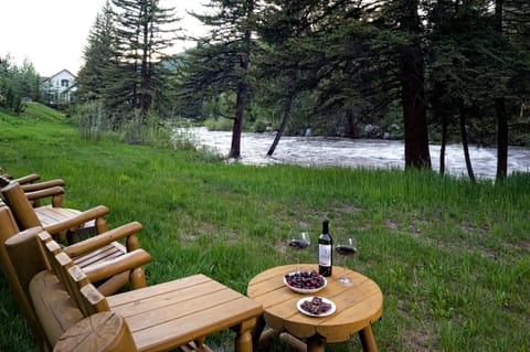 FLY FISH, PLAY YARD GAMES, BOCCE, RELAX ON OUR LOG FURNITURE, SEATS 9 TO 11.
