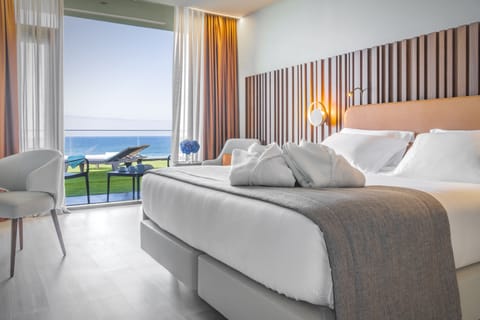 Suite, 1 King Bed with Sofa bed, Sea View | Premium bedding, minibar, in-room safe, desk