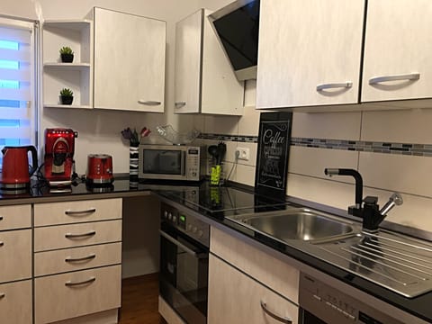 Apartment, Terrasse La Lucia | Private kitchen | Fridge, microwave, stovetop, dishwasher