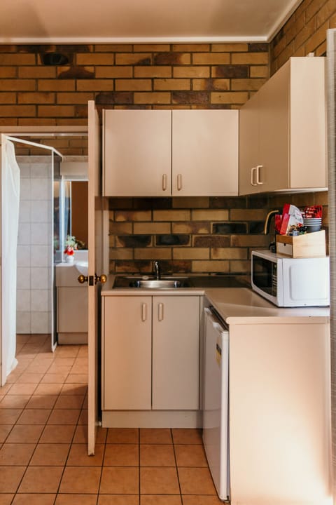 Two Bedrooms Suite | Private kitchen | Fridge, microwave, electric kettle