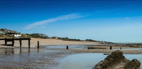 On the beach, sun loungers, beach umbrellas, beach towels