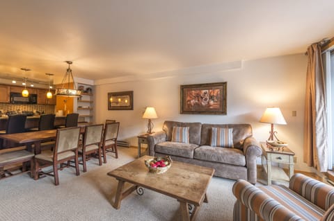 3rd floor level seats 11 for meals (8 at dining table + 3 at eating bar).