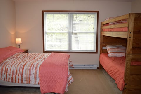 Bedroom #3. One full bed and set of single bunk beds.