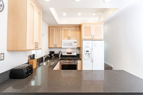 Kitchen is fully-stocked with dishes, cooking, baking and meal prep gear. All standard large and small appliances included. See listing description for more supply details.