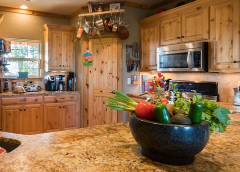 Cooks' Kitchen. Induction stove, cutlery, 3 coffee makers, crockpot, griddle.