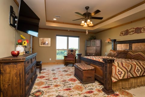 Master Retreat. Canyon view. Custom bedding on artistic Copper/Wood King bed