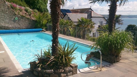 Seasonal outdoor pool, open 8:00 AM to 8:00 PM, sun loungers