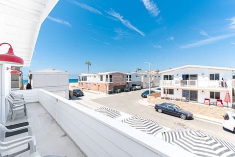 The front balcony includes a gas propane grill, the perfect set up for sunset cookouts.