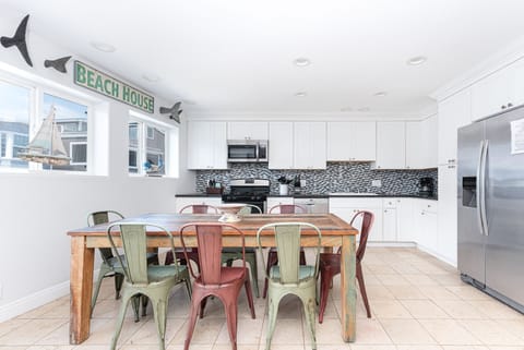 The kitchen comes stocked with dishes, utensils, cookware, bakeware, and all major and small appliances.