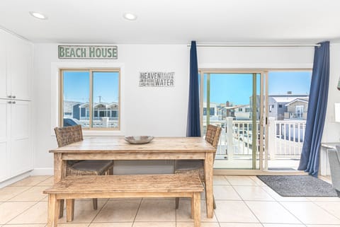 The kitchen opens out to the dining area, making meal prep a social affair!
                