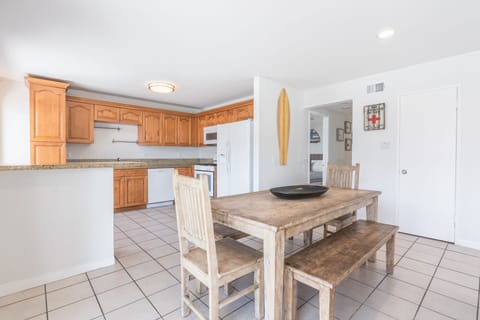 The kitchen opens out to the dining area, making meal prep a social affair!
                