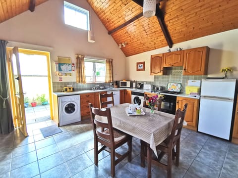 Kitchen with door to private patio