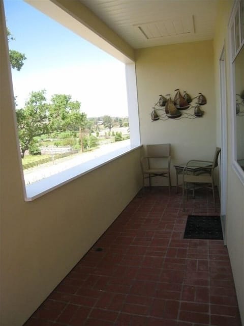 The balcony with bistro table for your enjoyment.