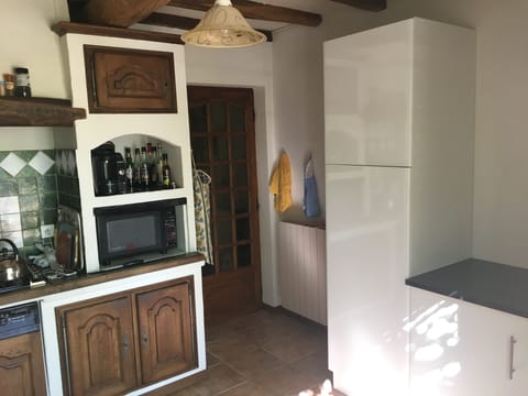 Provencal Kitchen which leads to patio