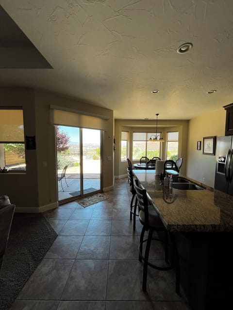 Open design for living room, dining and kitchen. Large walk in pantry!