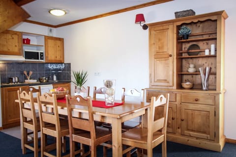 Enjoy a meal in the dining area.