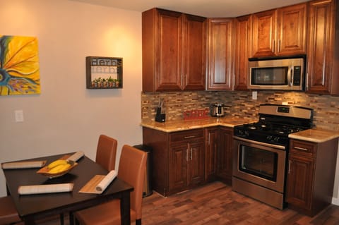 Gourmet Kitchen, fully stocked with high end Stainless Steel Appliances