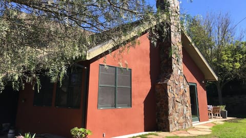 Trees and beautiful flowering shrubs surround the yard making it very private