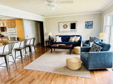 Living room combined with dining area offers plenty of seating for large groups.