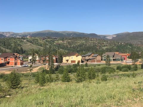 Sunny yellow townhome in a gorgeous location! Free bus line stops in front!