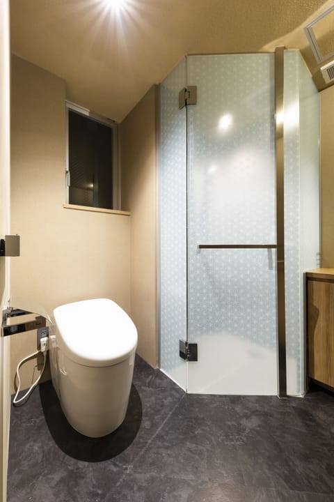 cyashitsu Suite Den | Bathroom | Hair dryer, towels