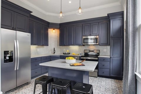 Beautiful chefs kitchen with marble countertops