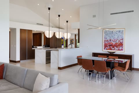 Enjoy an open layout that effortlessly connects the living, dining, and kitchen areas with the outdoors.