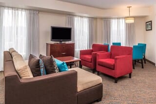 Executive Suite, 2 Bedrooms, Park View | Living area | 37-inch LCD TV with cable channels, iPod dock