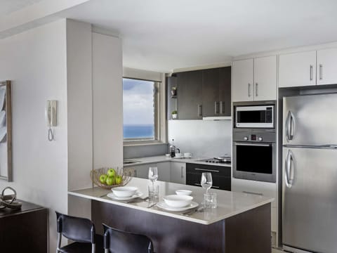 Two Bedroom Sub Penthouse | Private kitchen | Full-size fridge, microwave, stovetop, dishwasher