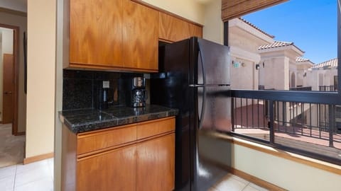Full kitchen with granite counters and modern appliances