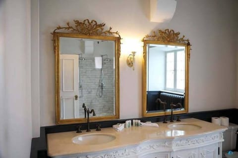 Exclusive Room, 1 King Bed | Bathroom | Separate tub and shower, deep soaking tub, rainfall showerhead