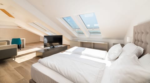 Junior Studio Suite - Loft | Minibar, in-room safe, desk, laptop workspace