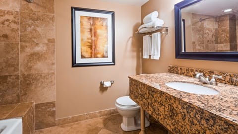 Suite, 1 King Bed, Non Smoking, Refrigerator (No Resort Fees) | Bathroom | Free toiletries, hair dryer, towels, soap