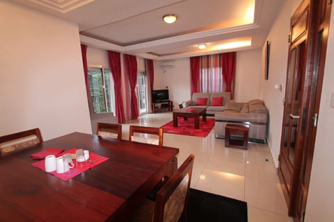 Executive Apartment, 3 Bedrooms, Golf View | Living room | 63-inch flat-screen TV with satellite channels, TV, DVD player