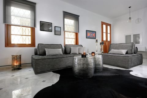 Deluxe Villa | Living area | Flat-screen TV