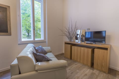 Apartment, 1 Bedroom | Living area | Flat-screen TV