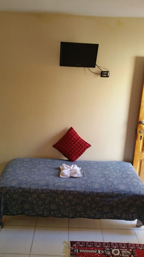 Economy Triple Room, 1 Bedroom | Premium bedding, down comforters, minibar, free rollaway beds