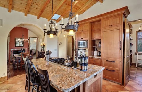 Gourmet kitchen. The dining room is just beyond it. Kitchen bar seats up to 3.