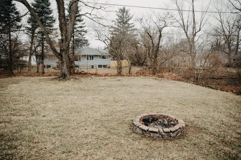 Backyard showing firepit