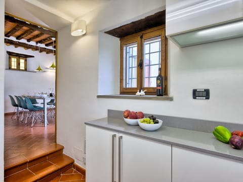 Modern, fully-fitted kitchen; two large fridges