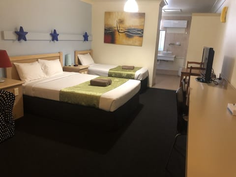 Family Triple Room, 1 Bedroom | Desk, iron/ironing board, free WiFi, bed sheets