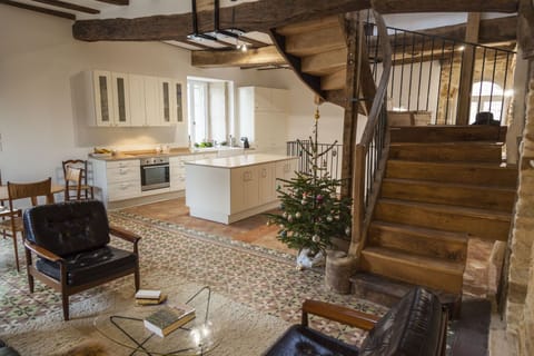 Ascend the solid oak staircase to the master bedroom.
