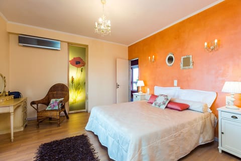 Master bedroom with double bed, closet room, air condition, & ensuite bathroom